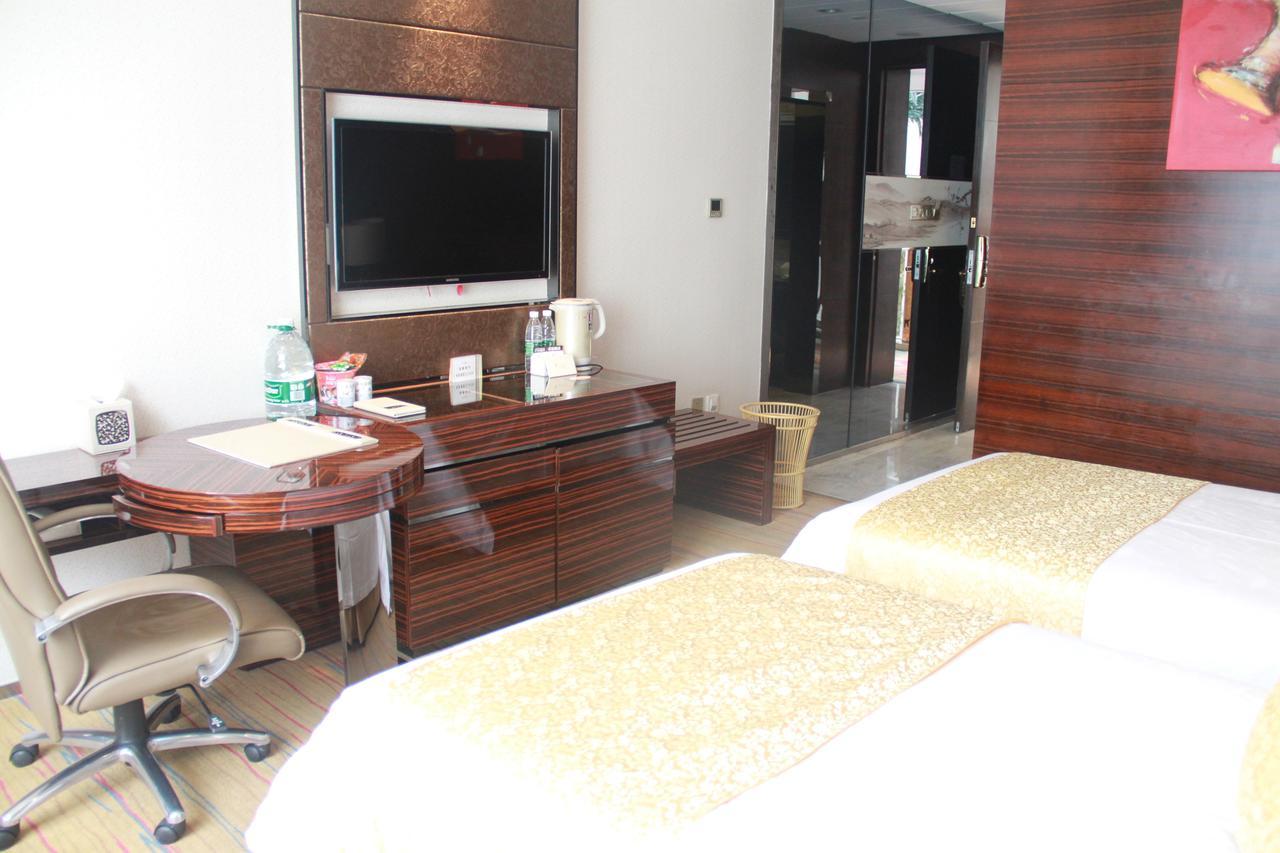 Huangjingang Holiday Hotel Jiexiu Chambre photo