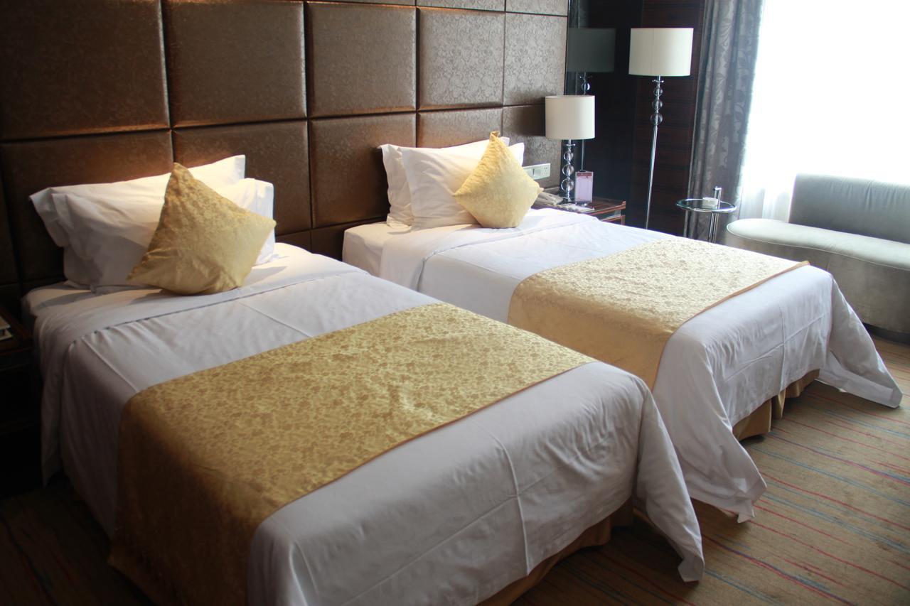 Huangjingang Holiday Hotel Jiexiu Chambre photo